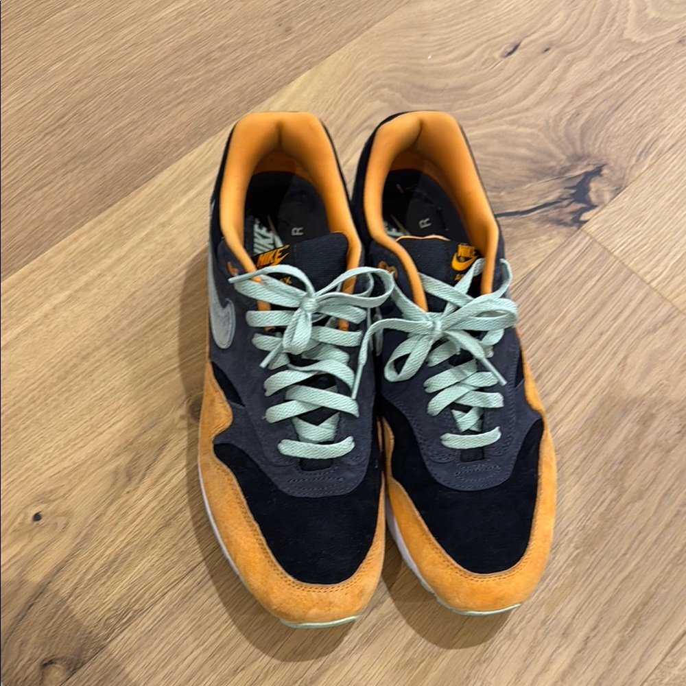 Nike Black and Orange Sneakers with Suede Finish